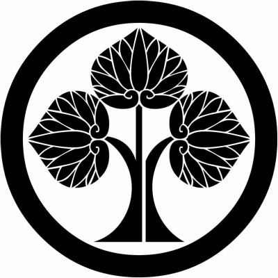 丸に右離れ立ち葵