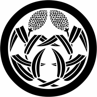 丸に違い抱き粟