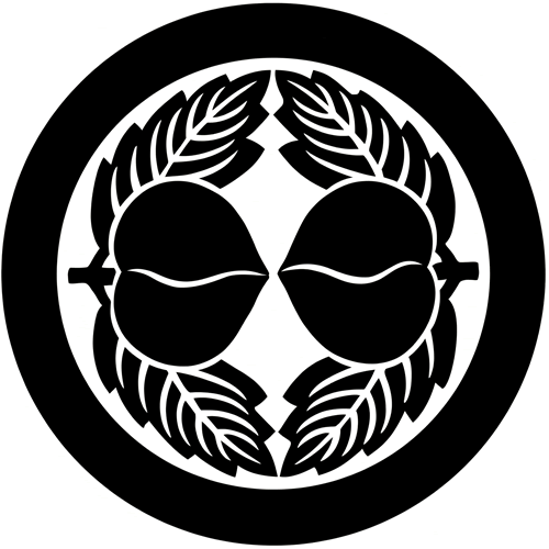 丸に対い葉敷き桃